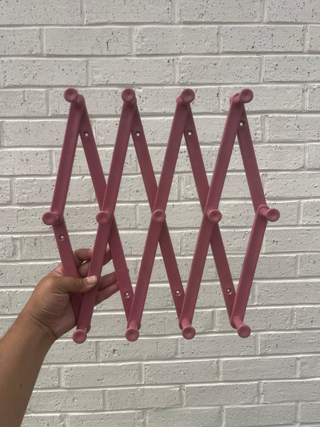 Mauve Pink Accordion Wall Rack