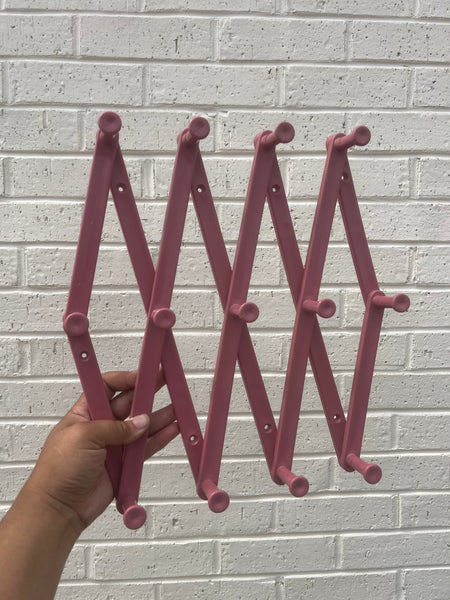 Mauve Pink Accordion Wall Rack